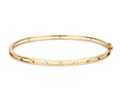 gold bangle bracelet with circles