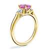 Classic Three Stone Engagement Ring with Emerald-Cut Pink Sapphire in 18k Yellow Gold (7x5mm)