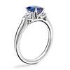 Classic Three Stone Engagement Ring with Emerald-Cut Sapphire in 14k White Gold (7x5mm)