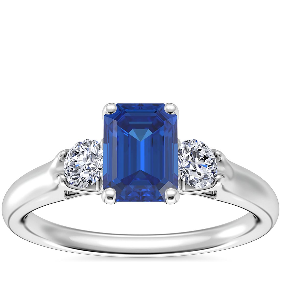 Classic Three Stone Engagement Ring with Emerald-Cut Sapphire in 14k White Gold (7x5mm)