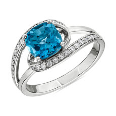 Cushion Cut Swiss Blue Topaz Ring with Twisting Halo in 14k White Gold