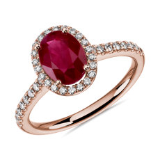 Anillo con rubí ovalado y halo de diamantes redondos en oro rosado de 14 k 8x6 mm