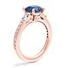 Tapered Baguette Diamond Cathedral Engagement Ring with Round Sapphire in 14k Rose Gold (8mm)