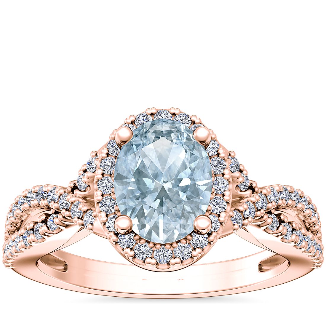 Anillo de compromiso de diseño torcido con halo de diamantes y aguamarina ovalada en oro rosado de 14 k (8x6 mm)
