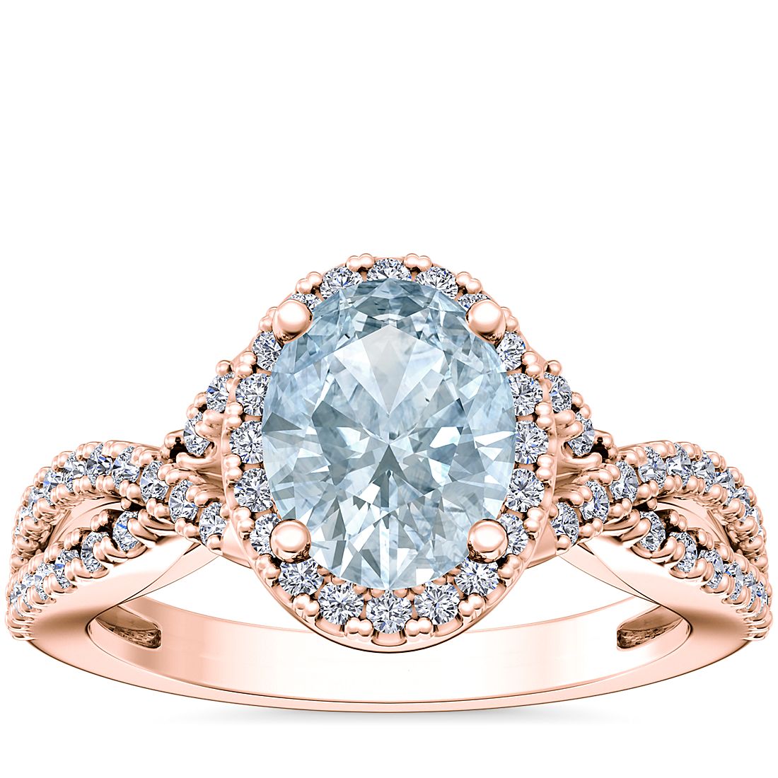 Anillo de compromiso de diseño torcido con halo de diamantes y aguamarina ovalada en oro rosado de 14 k (9x7 mm)