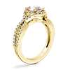Twist Halo Diamond Engagement Ring with Oval Morganite in 14k Yellow Gold (8x6mm)