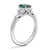 Vintage Three Stone Engagement Ring with Emerald-Cut Emerald in Platinum (7x5mm)