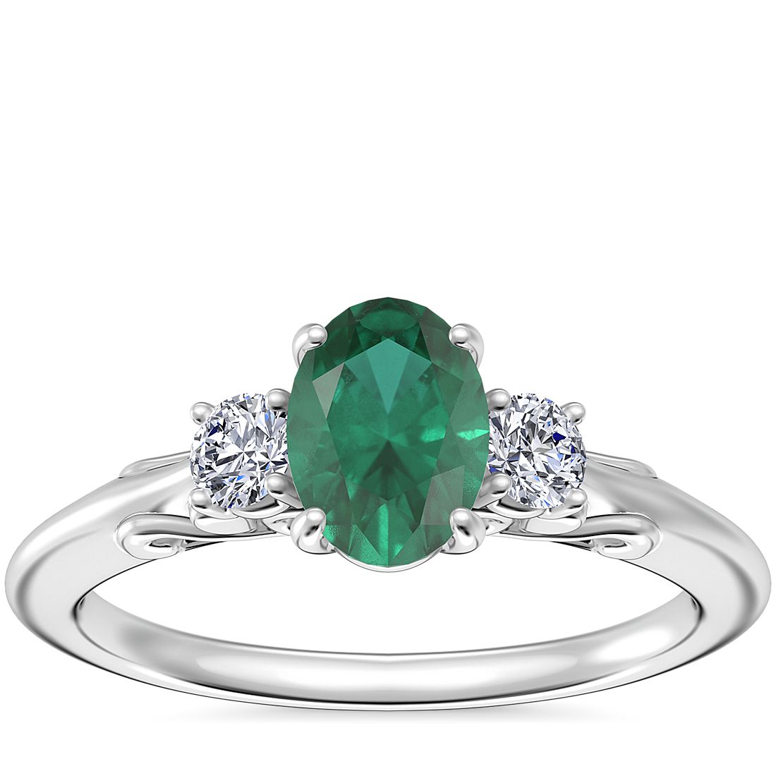 Vintage Three Stone Engagement Ring with Oval Emerald in Platinum (7x5mm)