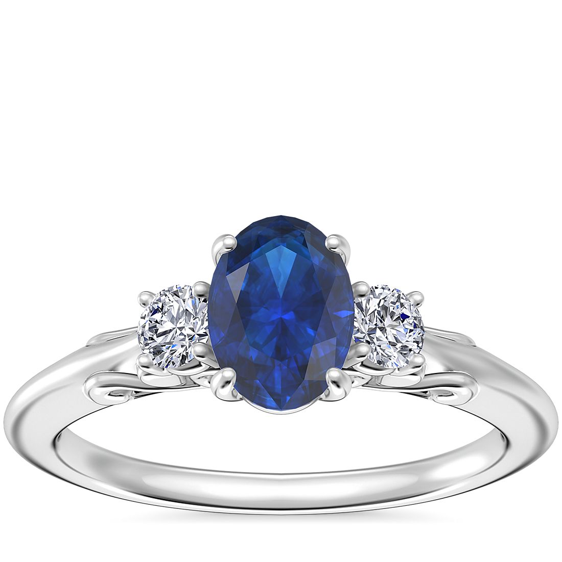 Vintage Three Stone Engagement Ring with Oval Sapphire in Platinum (7x5mm)