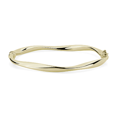 Top view of wedding ring shown with complementary ring