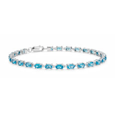 Petit bracelet ovale à topaze bleu intense en argent sterling(5 x 3 mm)