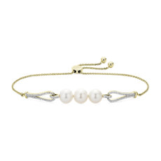Bracelet boules en perles d’eau douce blanches avec détails en diamant en or jaune 14 carats