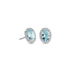 Oval Aquamarine and Diamond Halo Stud Earrings in 14k White Gold (5x7mm)