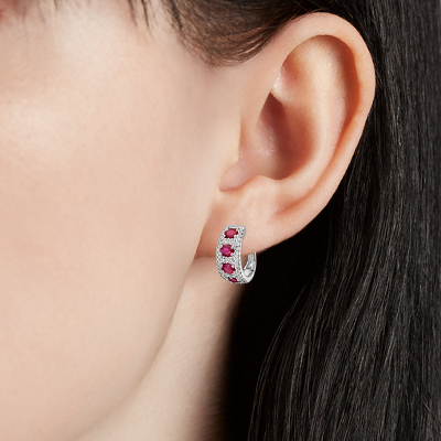 Closeup of earring on woman's ear