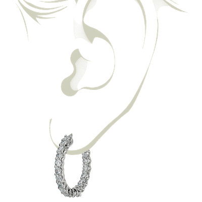 Closeup of earring on woman's ear