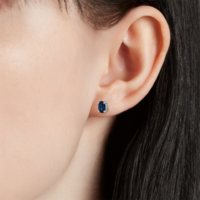 Sapphire stud with diamond accents 14k WG