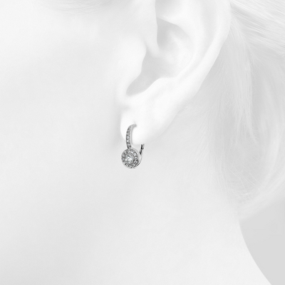 Closeup of earring on woman's ear