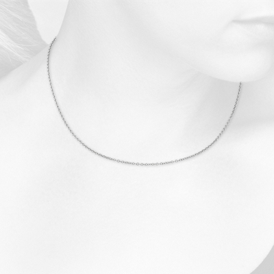 Closeup view of necklace on woman's neck