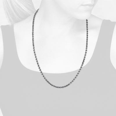 Closeup view of necklace on woman's neck
