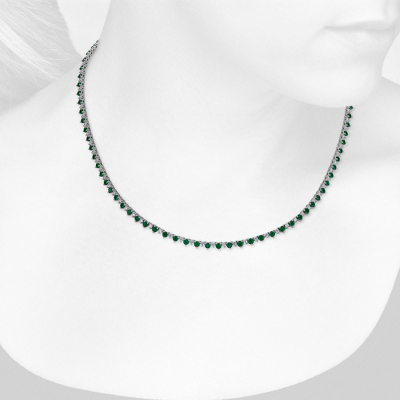 Closeup view of necklace on woman's neck