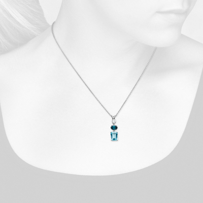 Closeup view of necklace on woman's neck