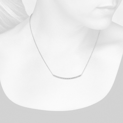 Closeup view of necklace on woman's neck