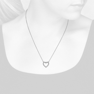 Closeup view of necklace on woman's neck