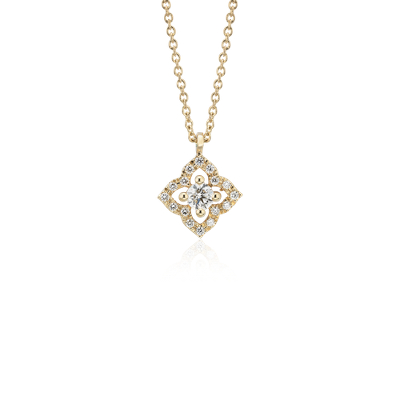 Colgante pequeño de diamantes con forma flor en oro amarillo de 14 k (1/6 qt. Nile