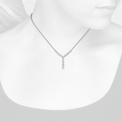 Closeup view of necklace on woman's neck