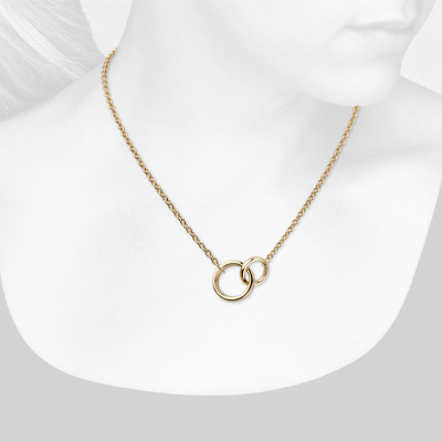 Closeup view of necklace on woman's neck