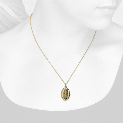 Closeup view of necklace on woman's neck