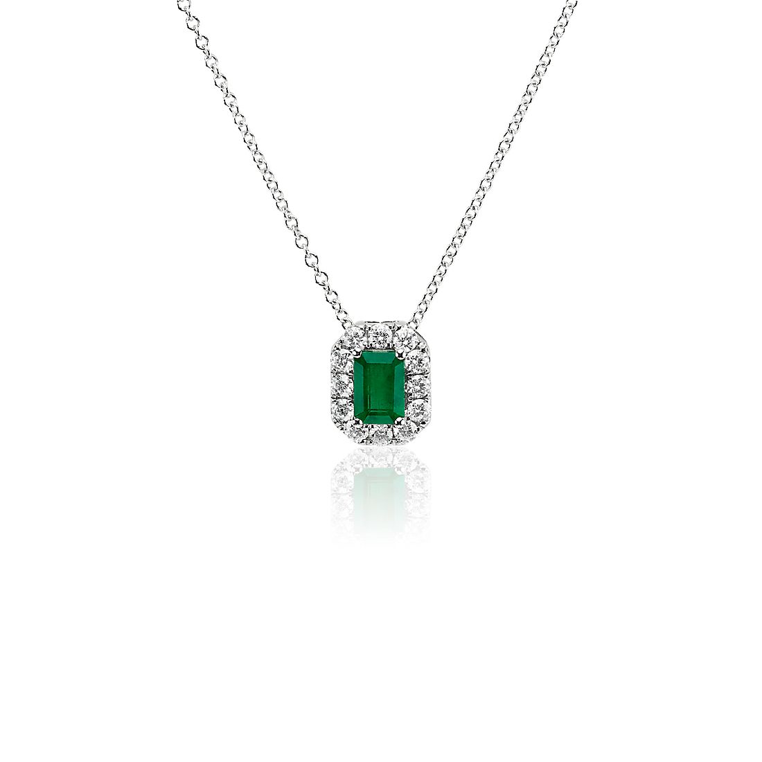 Emerald Cut Emerald and Diamond Halo Pendant in 14k White Gold (6x4mm)