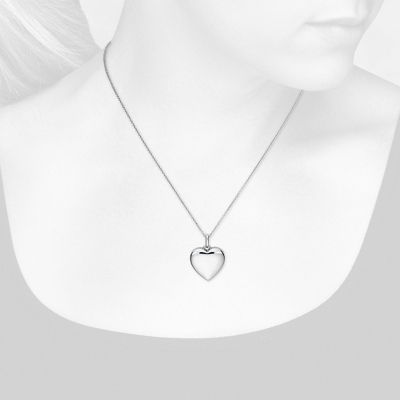 Closeup view of necklace on woman's neck