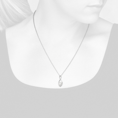Closeup view of necklace on woman's neck