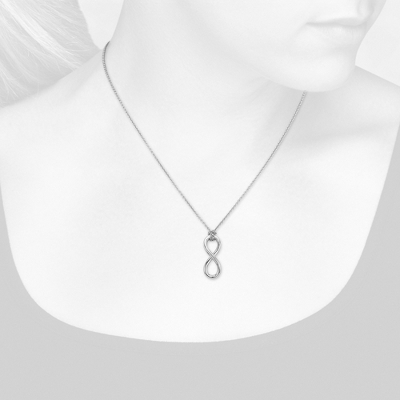 Closeup view of necklace on woman's neck