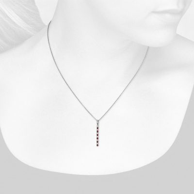 Closeup view of necklace on woman's neck