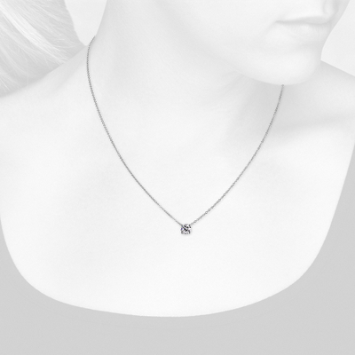 Closeup view of necklace on woman's neck