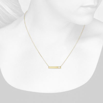 Closeup view of necklace on woman's neck