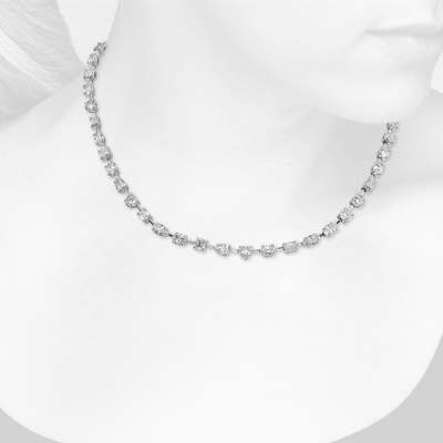 Closeup view of necklace on woman's neck