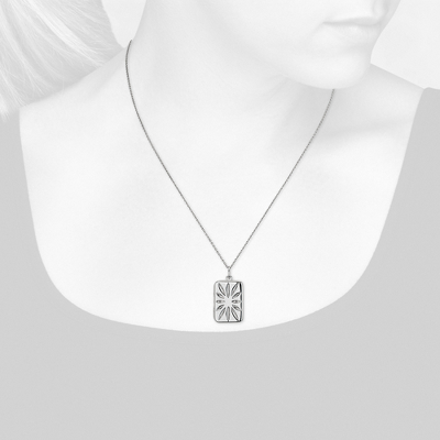 Closeup view of necklace on woman's neck