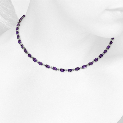 Closeup view of necklace on woman's neck