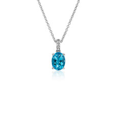 Oval Blue Topaz and Diamond Pendant in 14k White Gold (8x6mm)