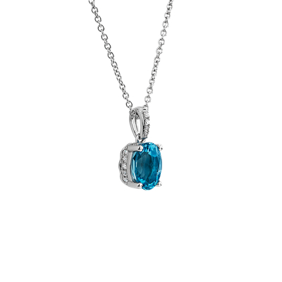 Oval Blue Topaz and Diamond Pendant in 14k White Gold (8x6mm)