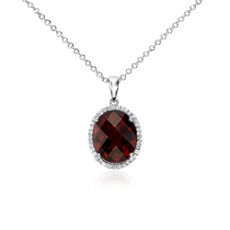 Garnet and White Sapphire Halo Oval Pendant in Sterling Silver (12x10mm)