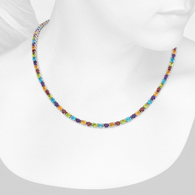 Closeup view of necklace on woman's neck