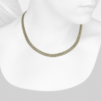 Closeup view of necklace on woman's neck