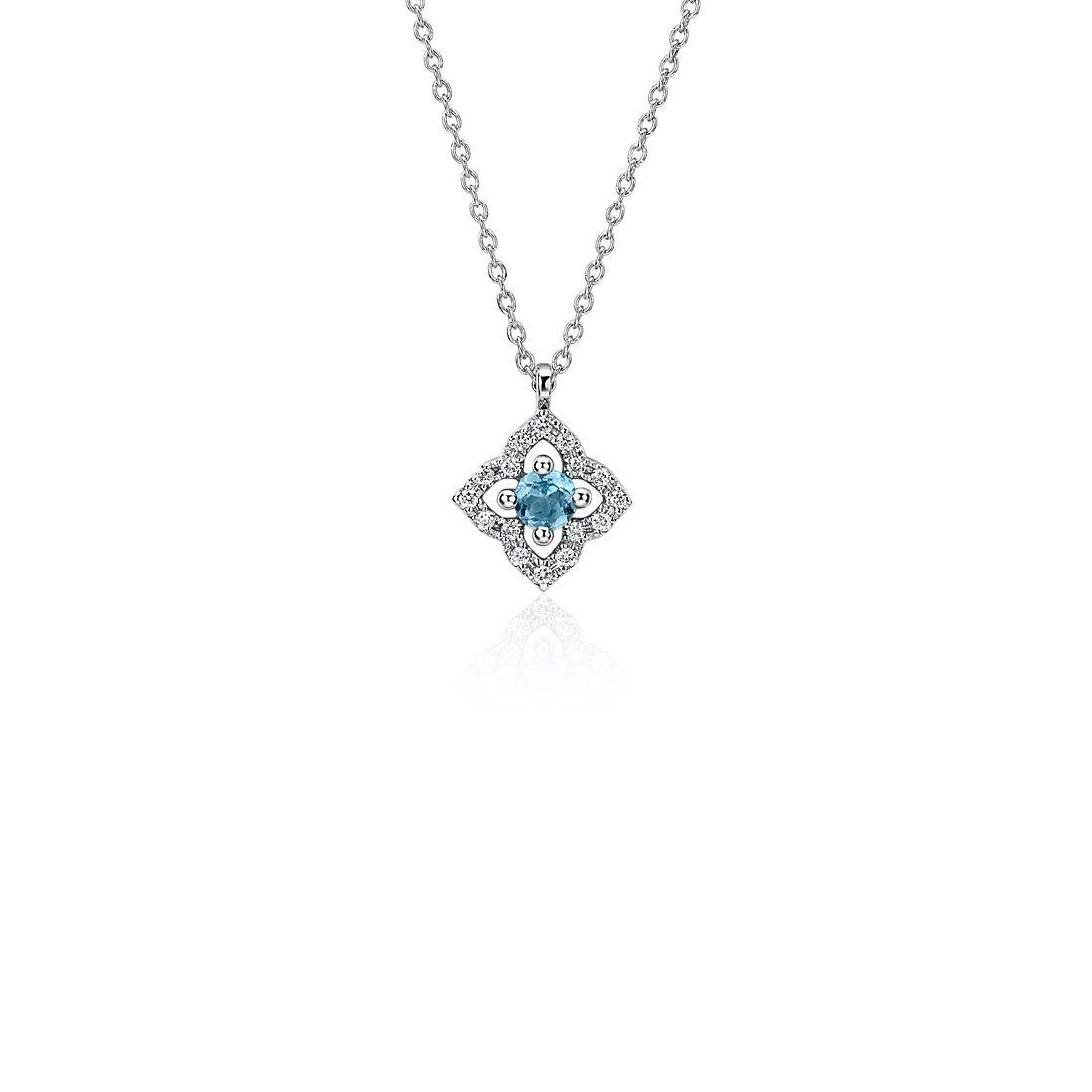 Petit pendentif edelweiss diamant et topaze bleue en or blanc 14 carats(2,8 mm)