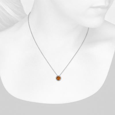 Closeup view of necklace on woman's neck