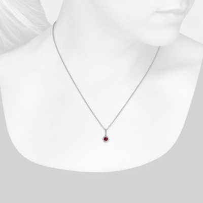 Closeup view of necklace on woman's neck