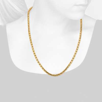 Closeup view of necklace on woman's neck